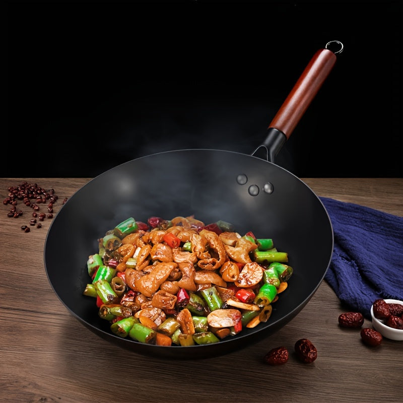 This essential item for home kitchens is the 1-piece Rust-Resistant Cast Iron Skillet with Wooden Handle in Black. With a round bottom design, this wok is perfect for gas stoves and is available in multiple sizes. Made of stainless steel and free of any