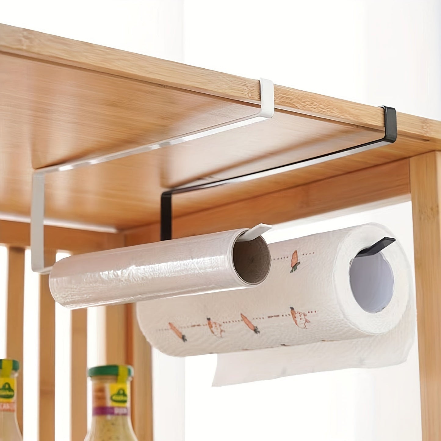 Easy to install under-cabinet paper towel holder, made of space-saving metal rack for kitchen use. Ideal for holding dishcloths and oil-absorbing sheets, no drilling necessary. Sleek metal design with iron construction, perfect for organizing kitchen