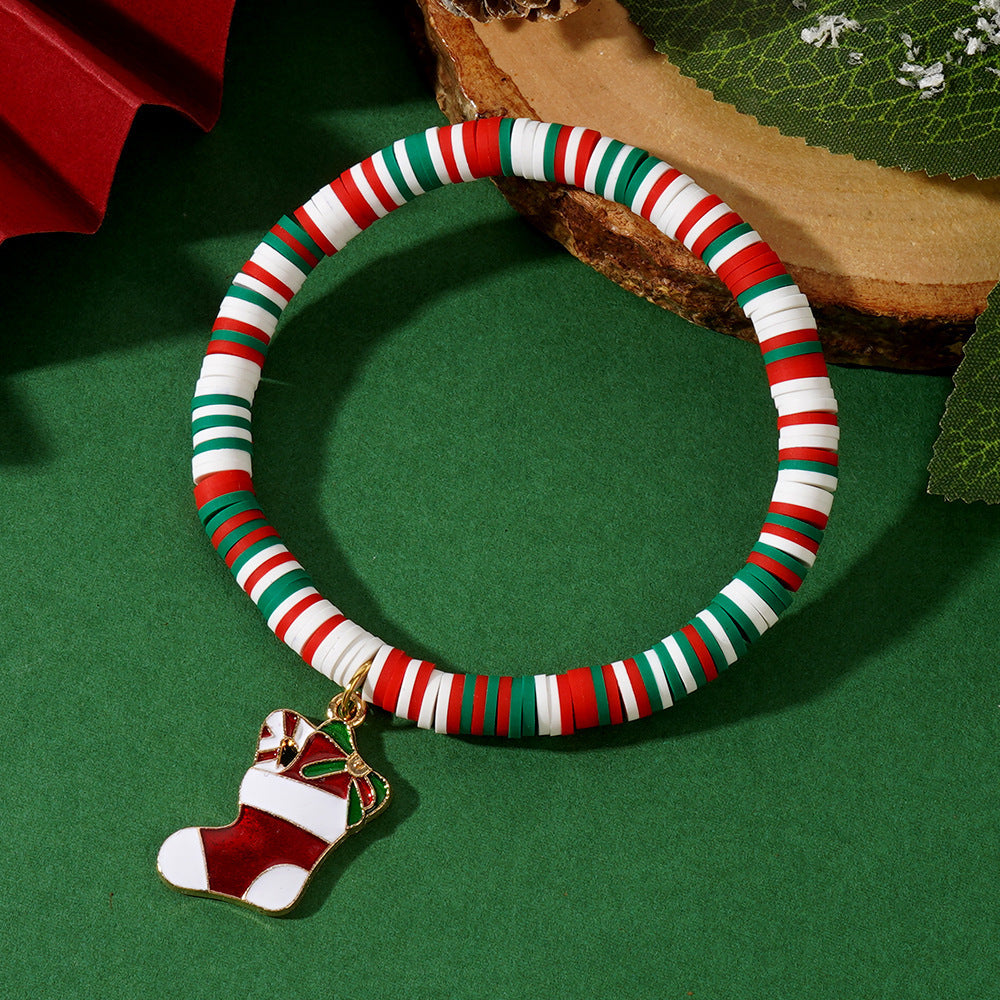 Get ready for the holiday season with this festive Christmas Charm Bracelet Set! Each set includes 10pcs of adjustable bracelets made with elastic polymer clay beads featuring Santa, snowflake, and tree designs. These bracelets are perfect for holiday