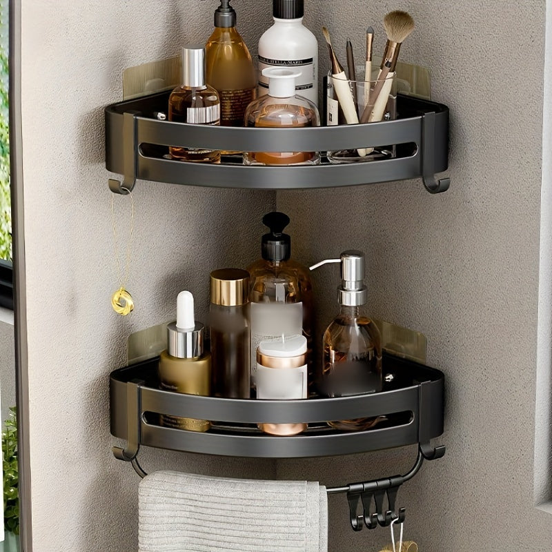 Wall-mounted bathroom storage rack for shampoo, shower gel, and cosmetics; made of space aluminum with no need for drilling.