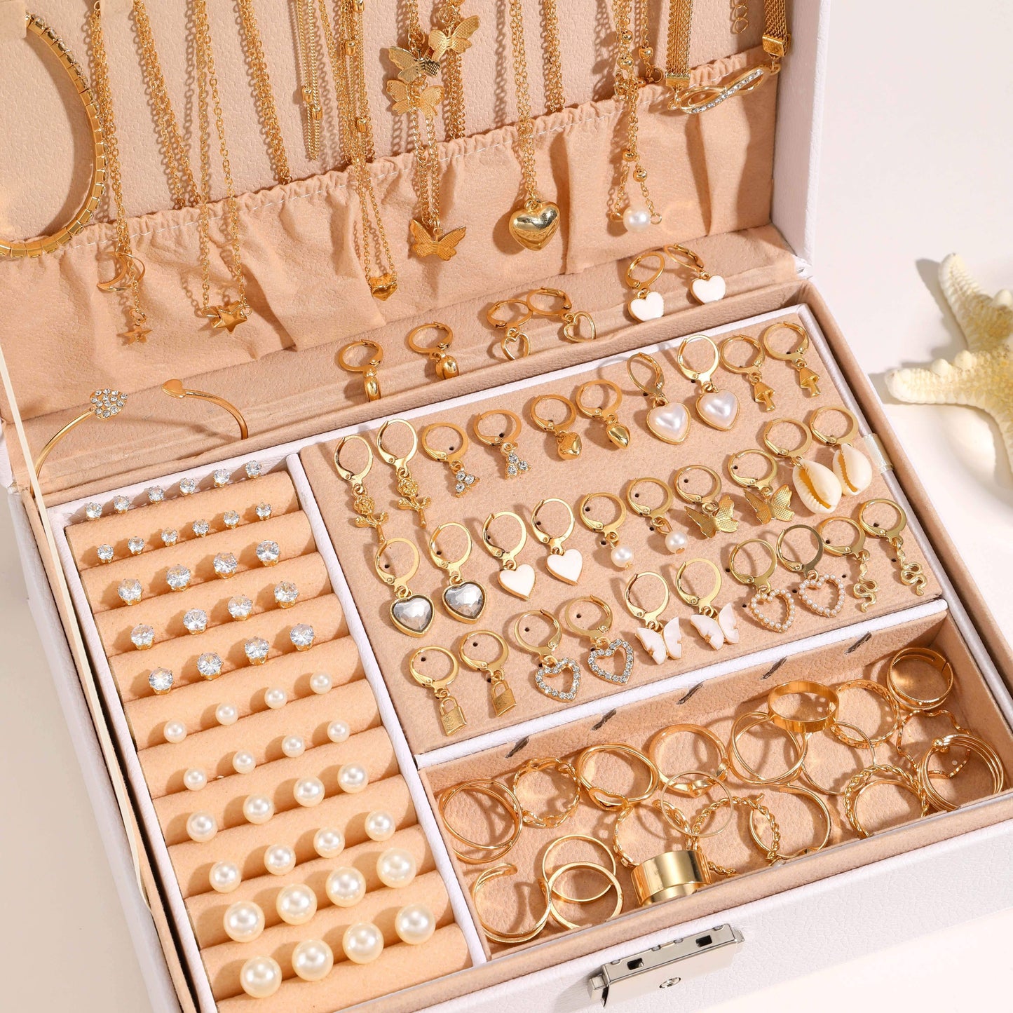 This stunning 115-piece jewelry set for women exudes vintage luxury with elegant zirconia, heart, and butterfly pendants. The set includes necklaces, bracelets, earrings, and rings, perfect for both casual attire and parties. Ideal as a Valentine's gift