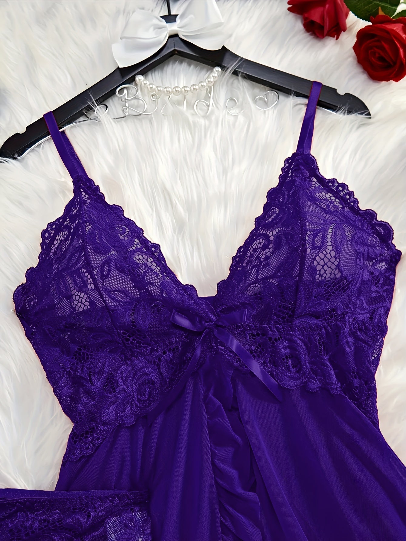 Sexy lace lingerie set for women includes polyester deep V-neck babydoll with ruffle hem, sheer bow-knot shorts, and G-string. Perfect for exotic sleepwear and undergarments.