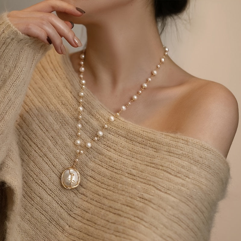 Vintage Baroque Pearl Necklace for Women - a stunning accessory that adds elegance to any outfit. Featuring freshwater pearls on a clavicle chain, this fashionable pendant boasts a simple yet stylish design. Made from high-quality alloy, this necklace is