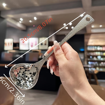 Sleek stainless steel long-handled spoon with leak-proof design, ideal for home and restaurant use.