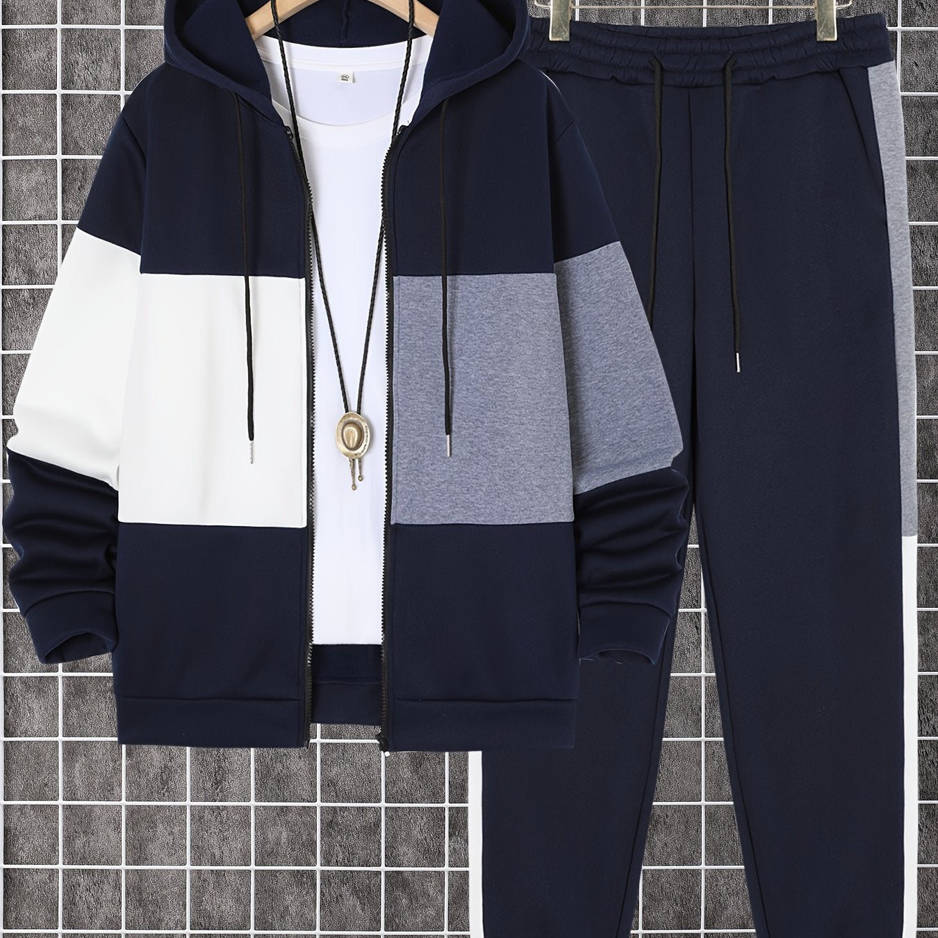 Men's 2-piece color block athletic tracksuit with long sleeve zip up hoodie, drawstring, and jogging pants for gym workouts and running.