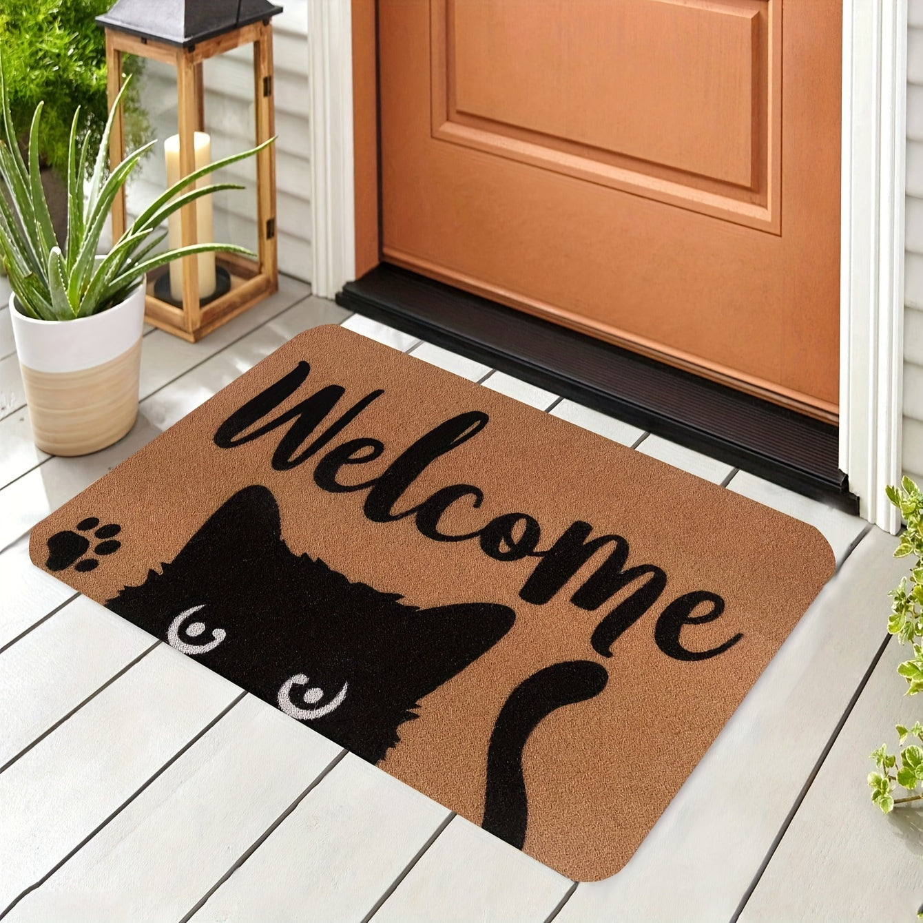 Introducing our Cat Welcome Doormat, featuring a non-slip backing for safety. Made from machine washable polyester, this indoor/outdoor rug is perfect for any entrance, porch, laundry room, or office. The fun cat design adds a whimsical touch to your