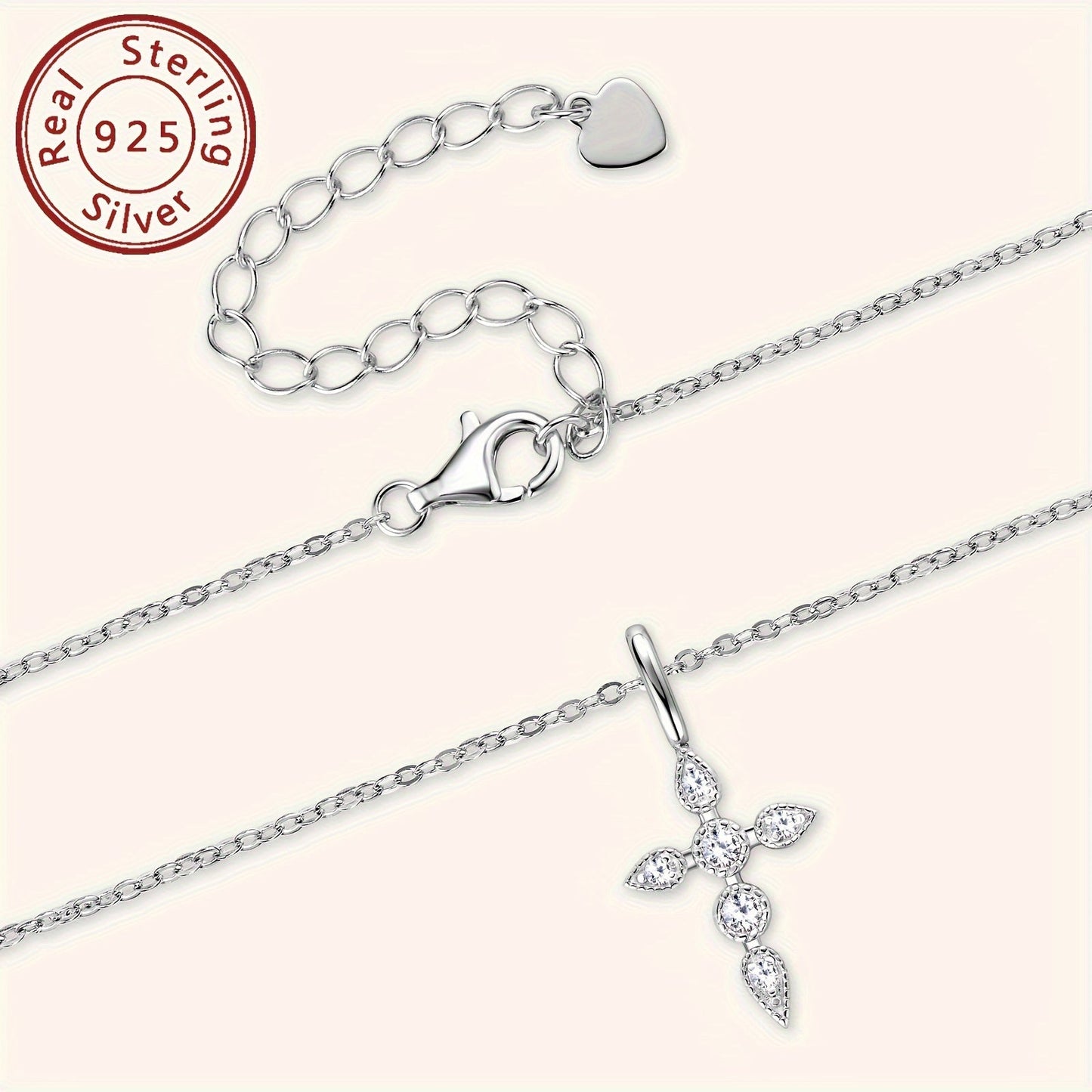 A stunning Mozambique stone cross necklace featuring a 925 sterling silver cross pendant. The necklace is decorated with a round Mozambique stone, measuring 40+5cm/16+2 inches in length. The silvery weight of the necklace is 2.29g, with the Mozambique