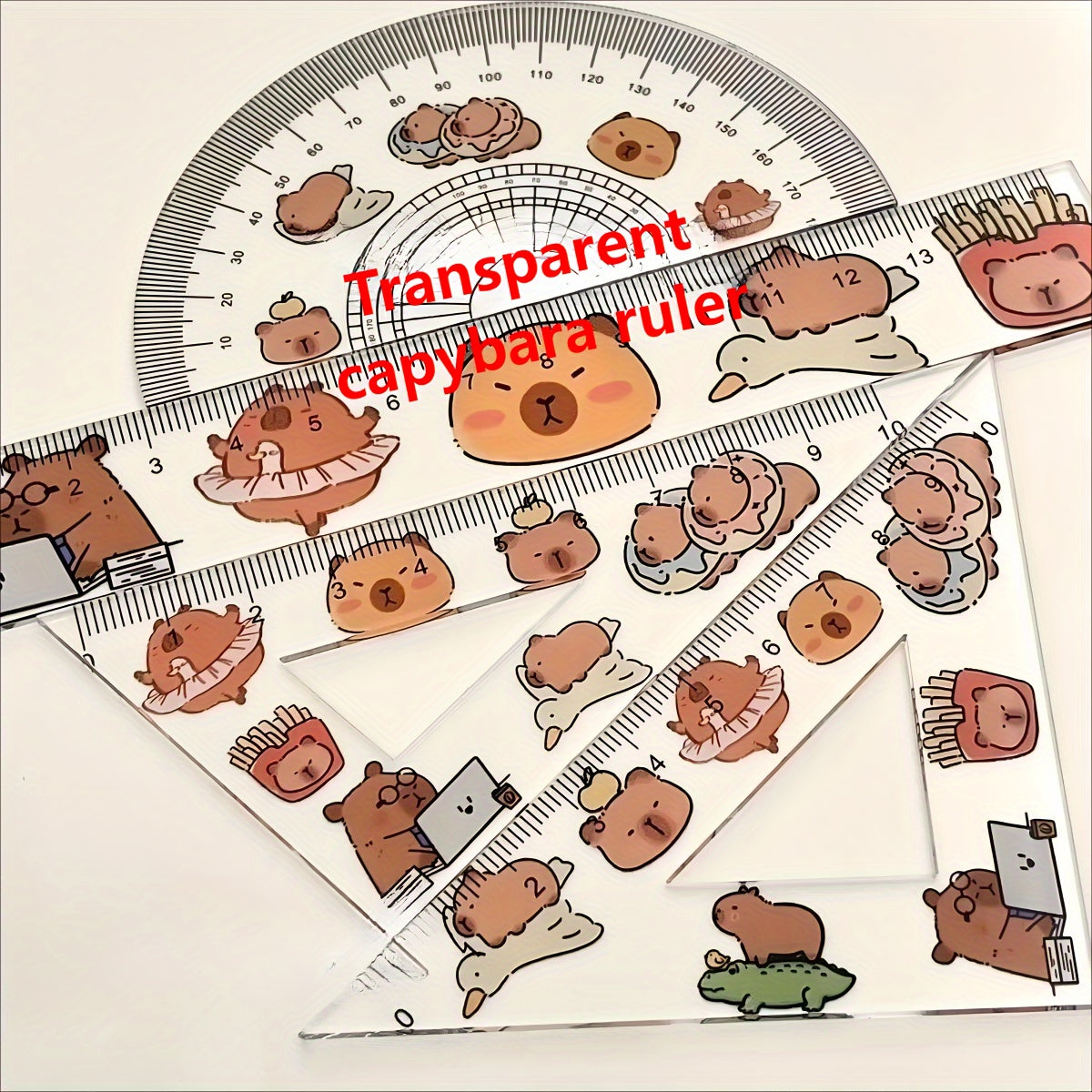 One set of 4 plastic transparent Capybara-themed rulers for drawing tests, including a triangle ruler board. Cute kawaii stationery for school supplies.