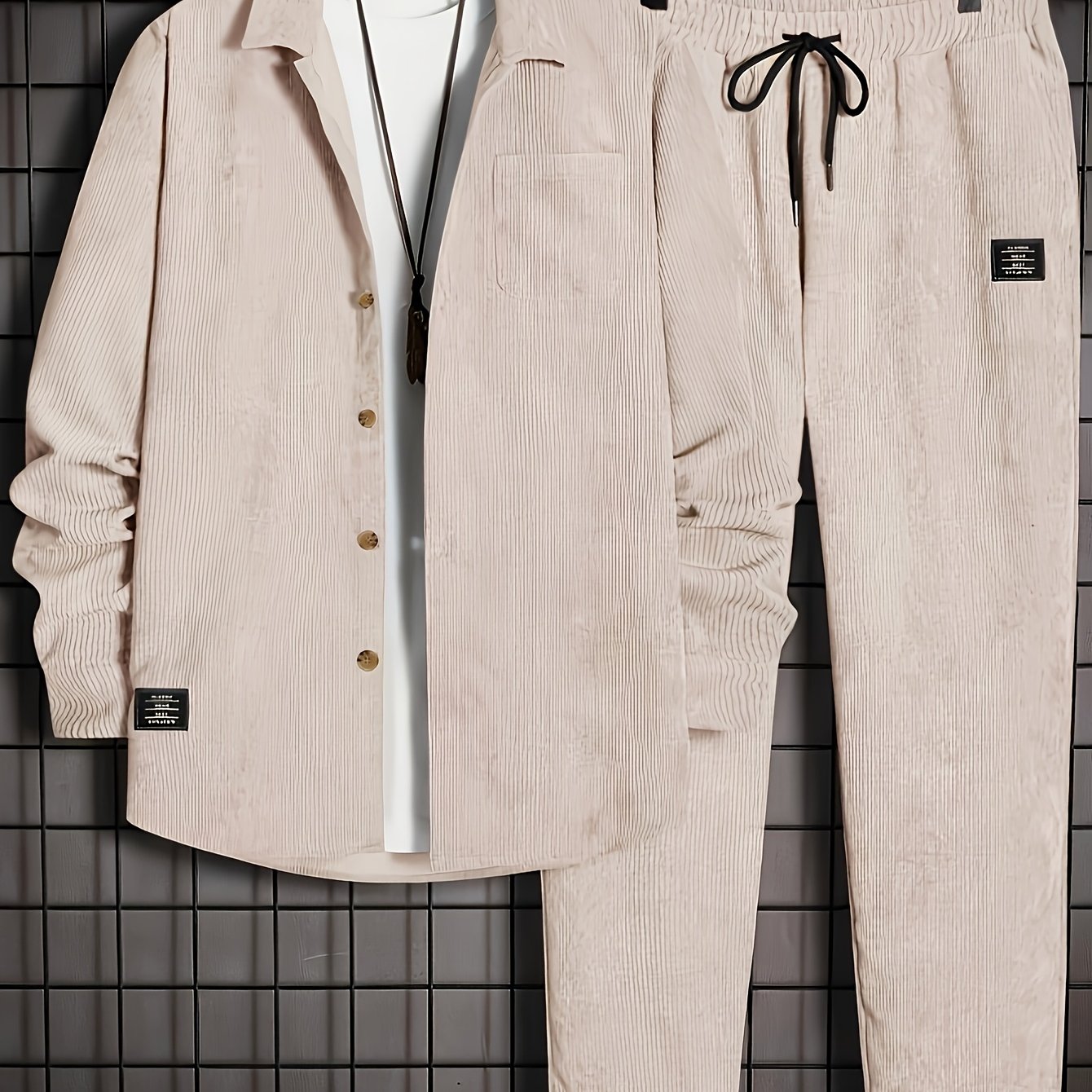 Men's corduroy lapel two-piece suit for daily or casual wear in autumn and winter, featuring slanted pockets, drawstring design, and loose fit.