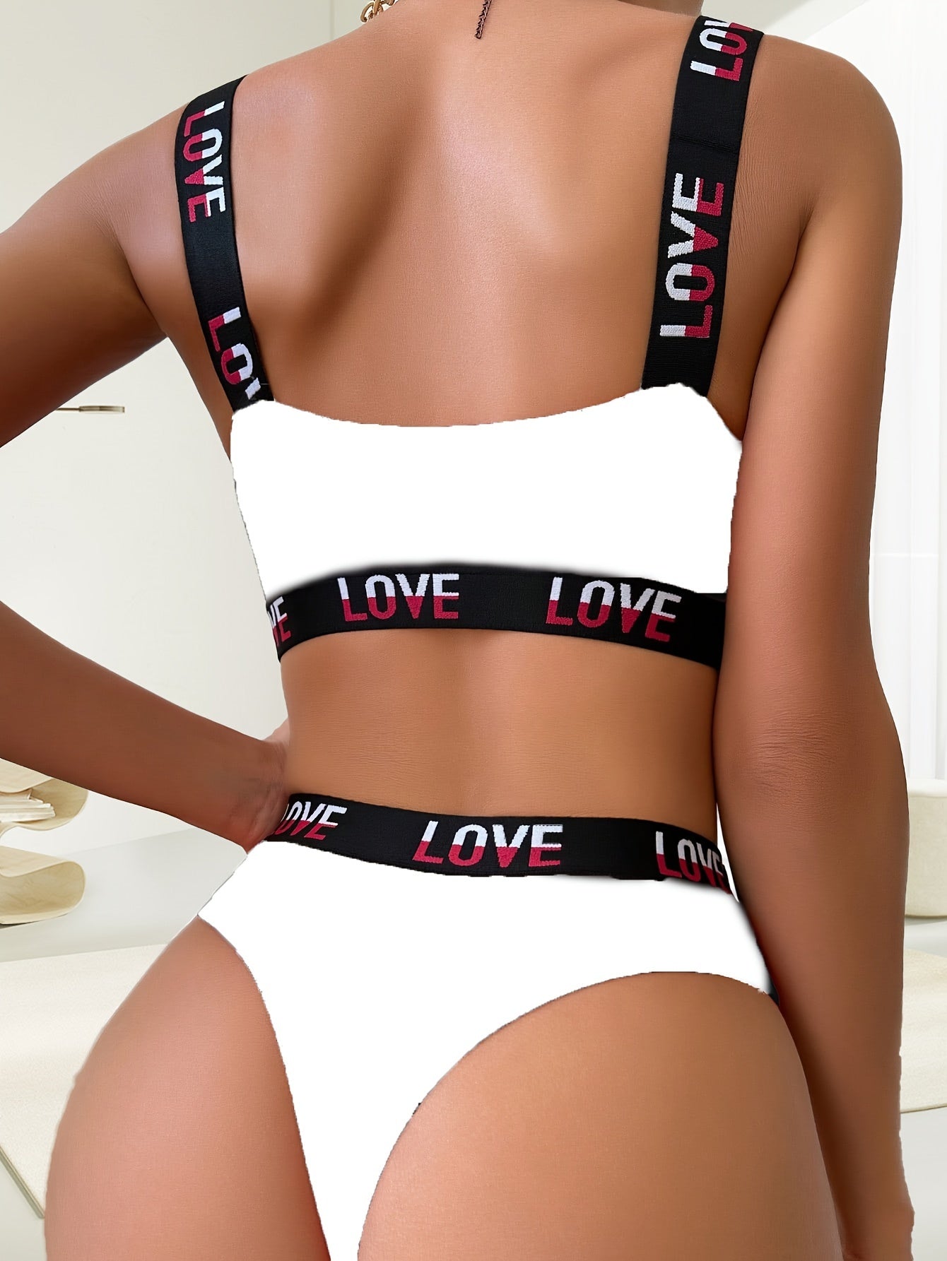 Ribbed bra and thong set with contrasting color letter print.