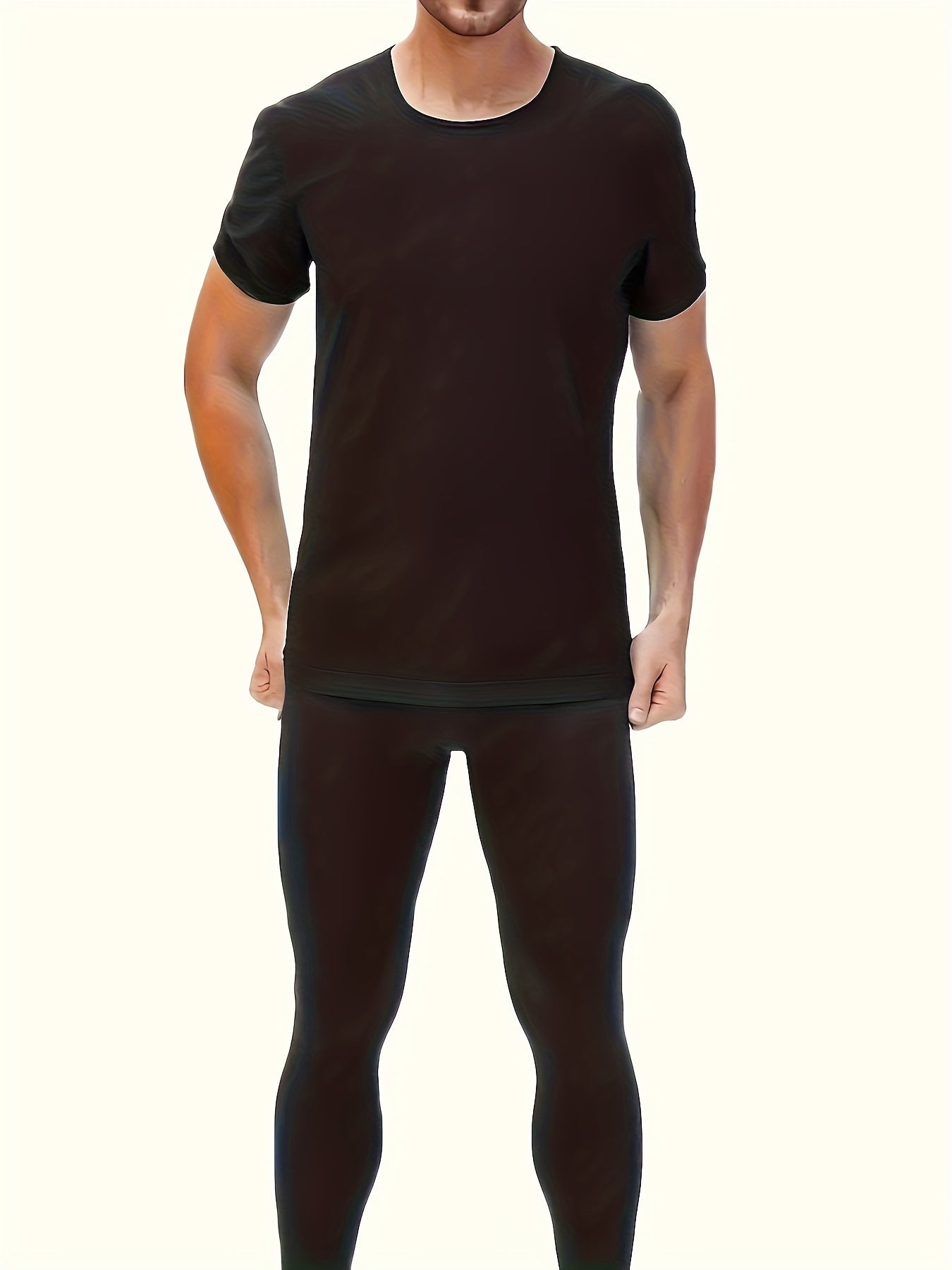 Men's short-sleeve sweat-wicking sports shirt and sauna suit for fitness training.