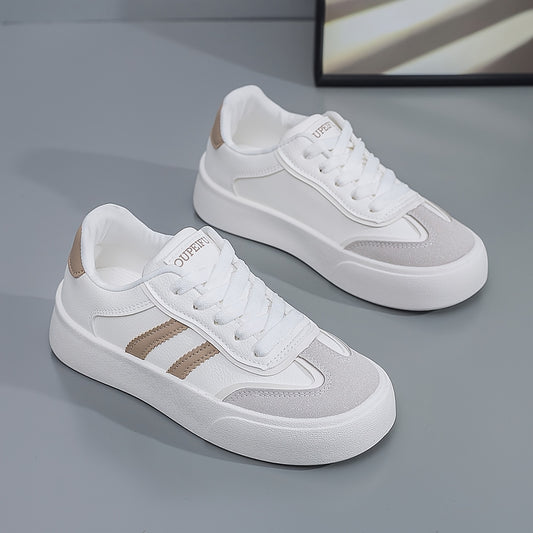 Women's lightweight white sneakers with beige accents are comfortable all-season footwear with a trendy classic design.