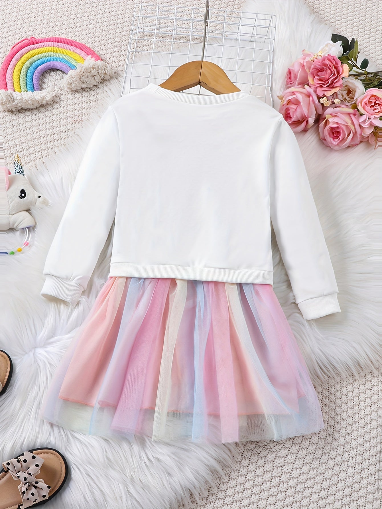 Rainbow tutu dress with unicorn print for girls, perfect for parties or vacations in spring or autumn.