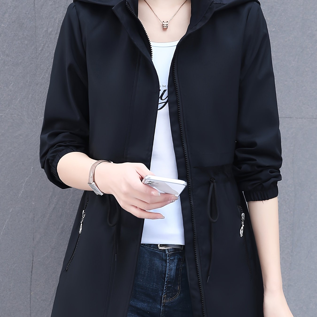 Zip-up windbreaker hoodie jacket with drawstring waist, slant pockets, suitable for spring and fall. Women's casual clothing.