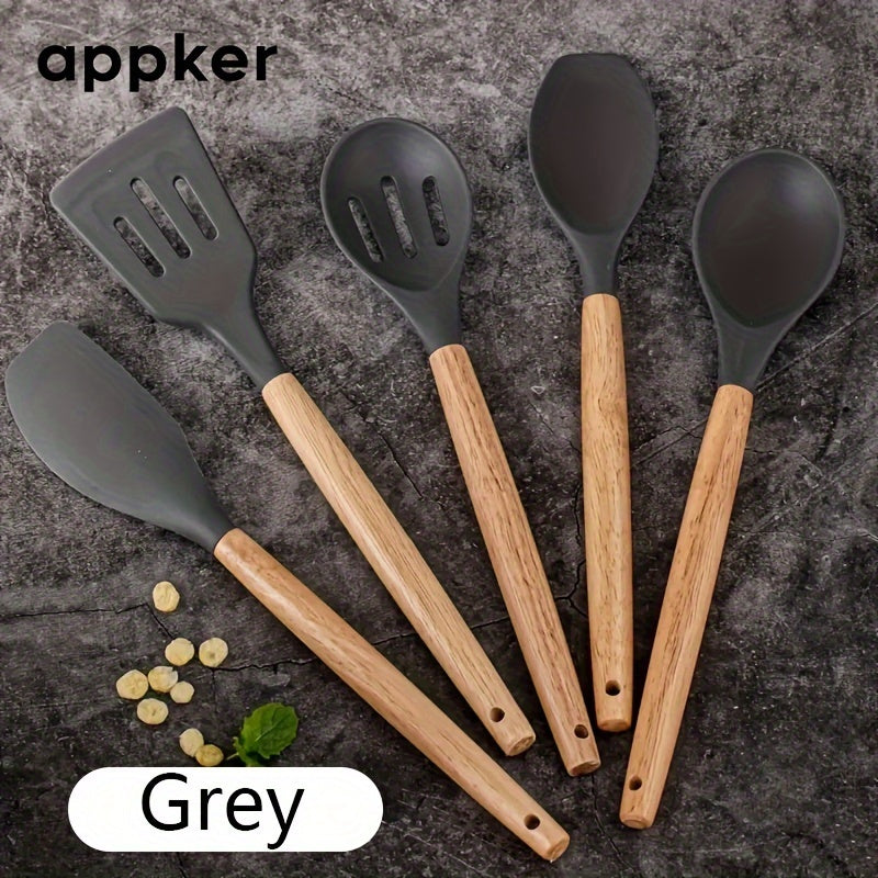 Appker's 5-piece Silicone Kitchen Utensil Set features Non-Stick, Safe Cooking Tools with Wooden Handles. Washable and Modern, this set is Perfect for Home Chefs.