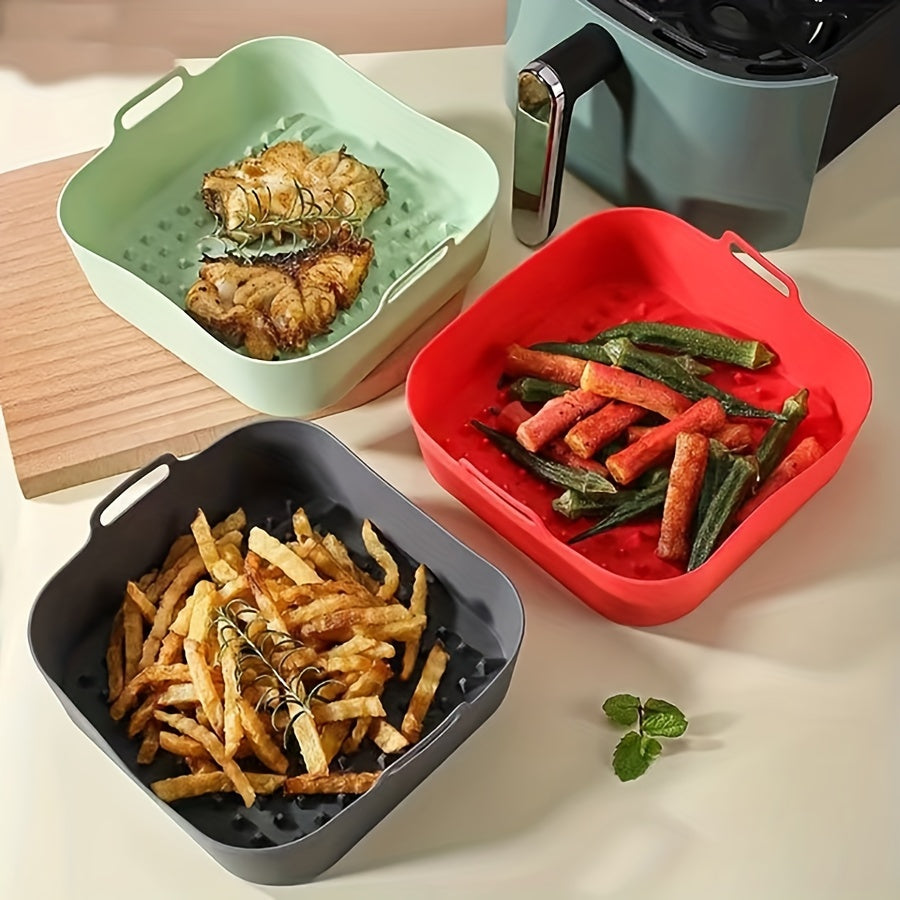 Get 1 piece or a set of 3 pieces of WIEZ Silicone Air Fryer Liners, measuring 19.56cm square. These reusable baking trays are food-safe oven accessories and essential kitchen gadgets for healthy cooking.