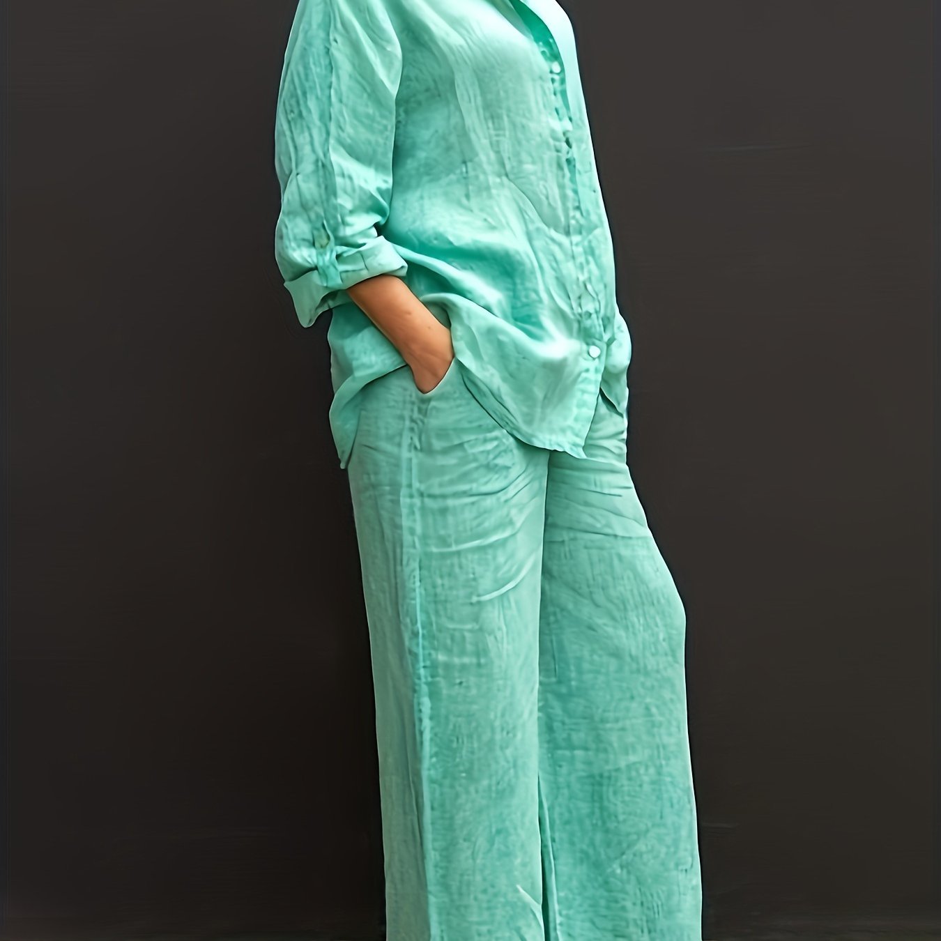 Women's casual chic two-piece set includes a long sleeve button-up shirt and wide-leg pants in a solid color. Machine washable for convenience.