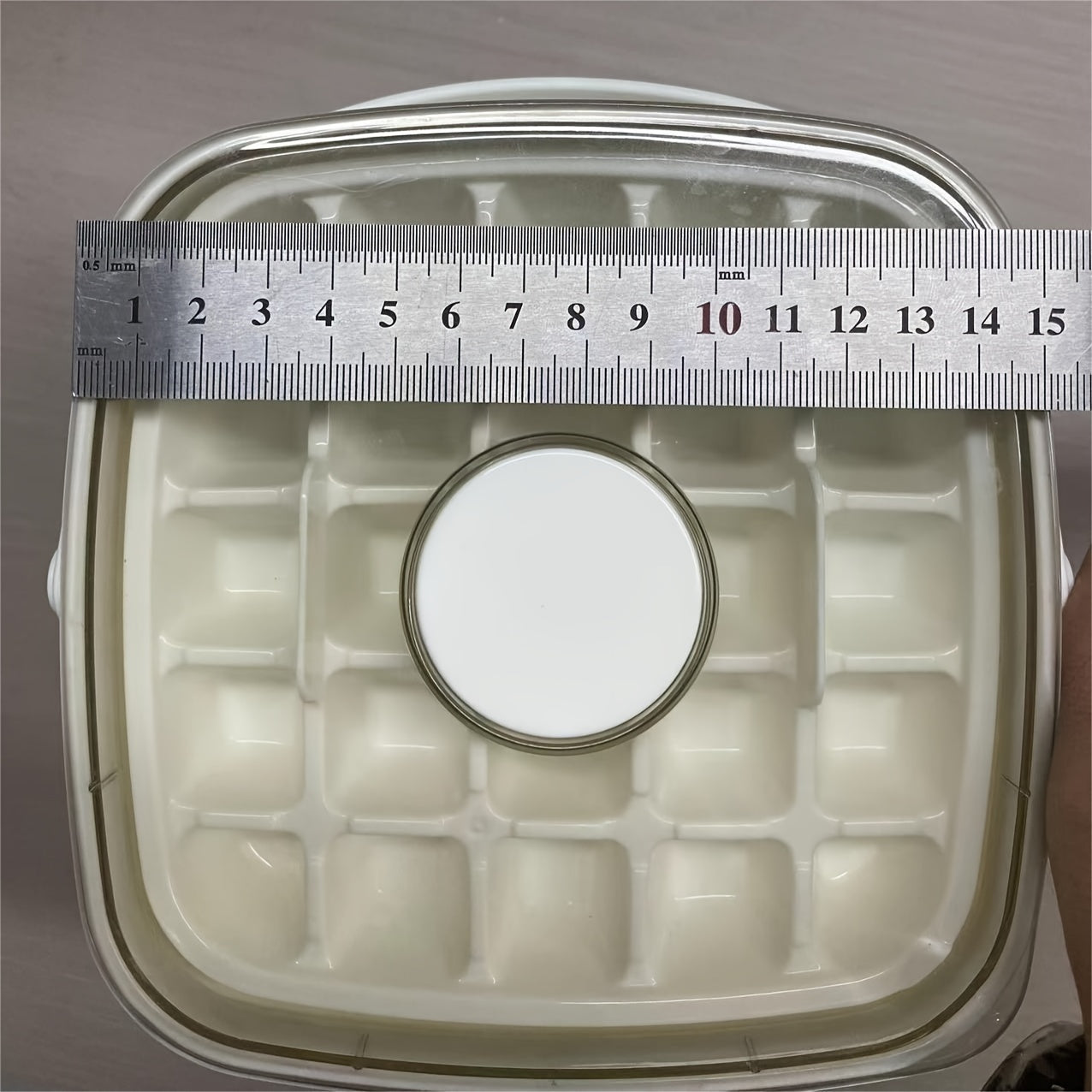 48-cube ice maker with press lid, double-layer plastic tray for freezer, ideal for whiskey & cocktails, essential kitchen tool.