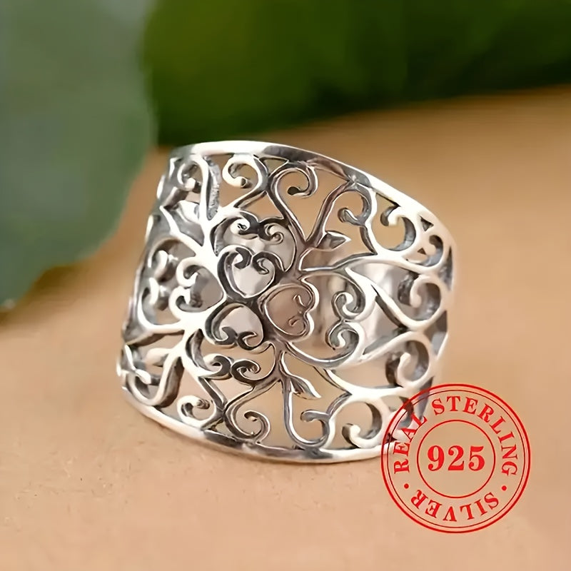 Vintage Bohemian Style 925 Sterling Silver Wide Band Ring featuring a stunning large openwork leaf design, perfect for weddings and gifts. This elegant piece showcases a neutral hollow vine pattern that is both timeless and versatile.