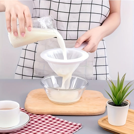 A handheld FineMesh Silicone Strainer with ultra-fine mesh for efficiently filtering soy milk and juice. This quick finish tool is safe for food contact and suitable for both men and women.