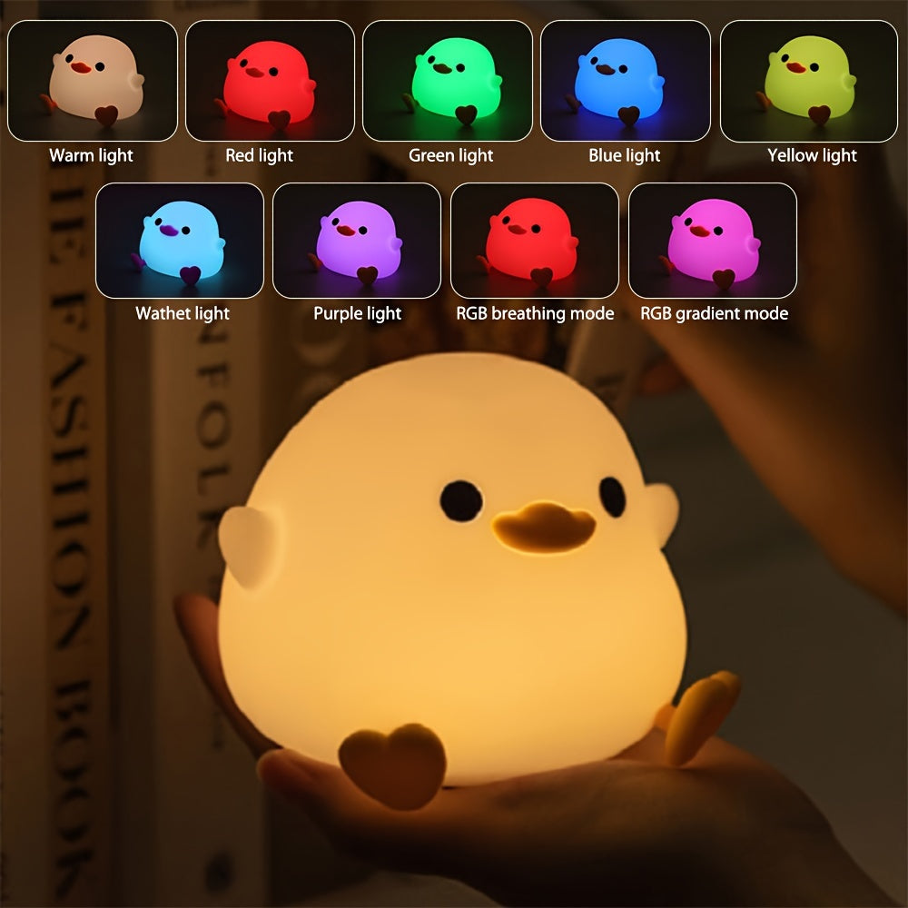 Cute duck-shaped touch control night light with RGB color changing, soft silicone bedside lamp, USB-C rechargeable desk light, perfect gift for any room.