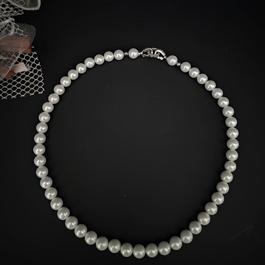 Impeccably crafted from natural freshwater pearls measuring 7-8mm, this stunning necklace features a silvery diamond round buckle. Presented in an elegant gift box, it is suitable for both male and female recipients and perfect for everyday wear