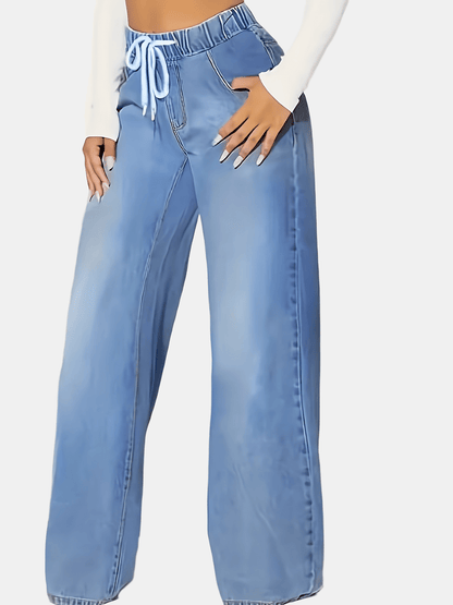 Women's light blue elastic waist drawstring washed stretchy straight-leg wide-leg jeans with slant pockets.