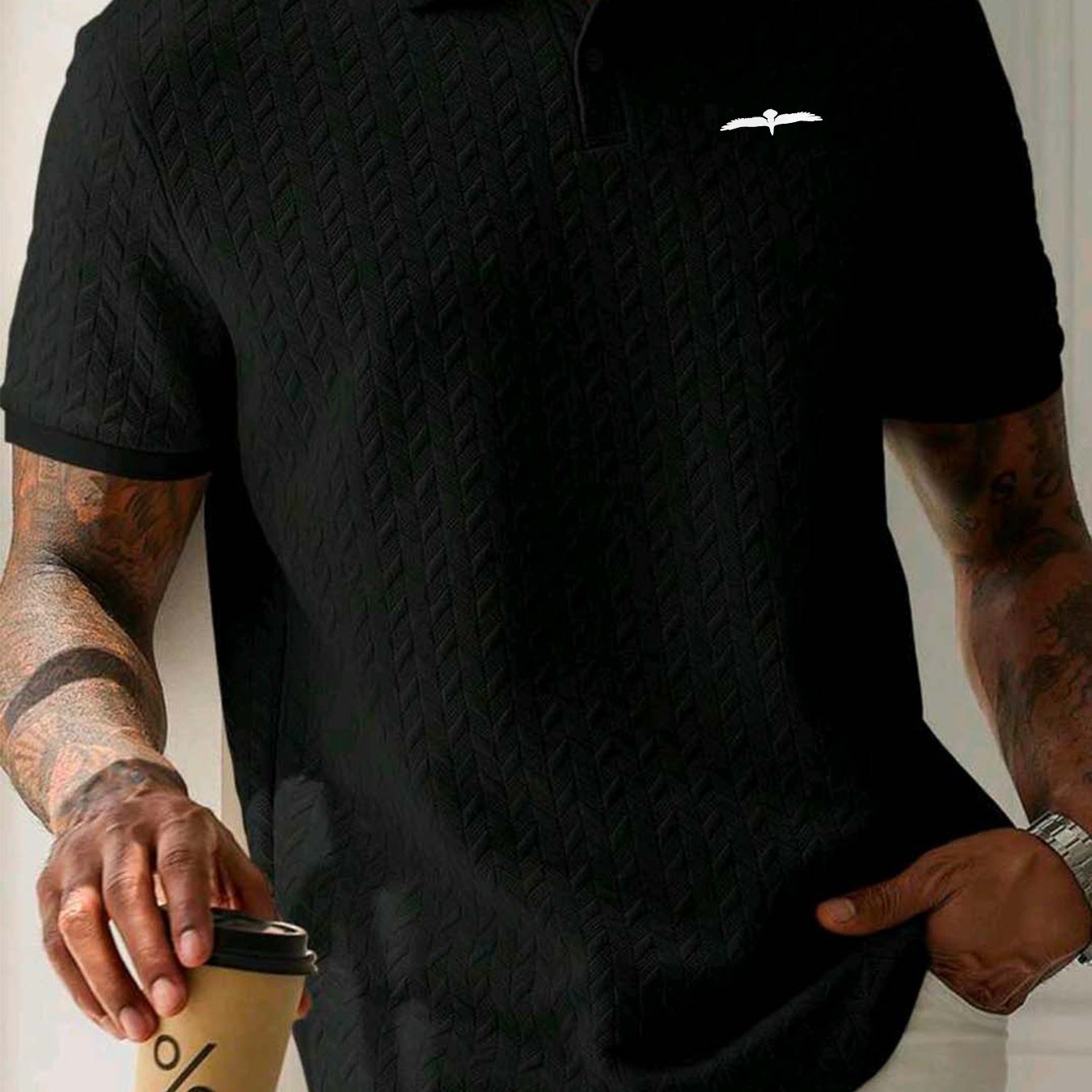 Men's polo shirt with eagle print, short sleeves, and slight stretch. Ideal for summer sports and leisure.