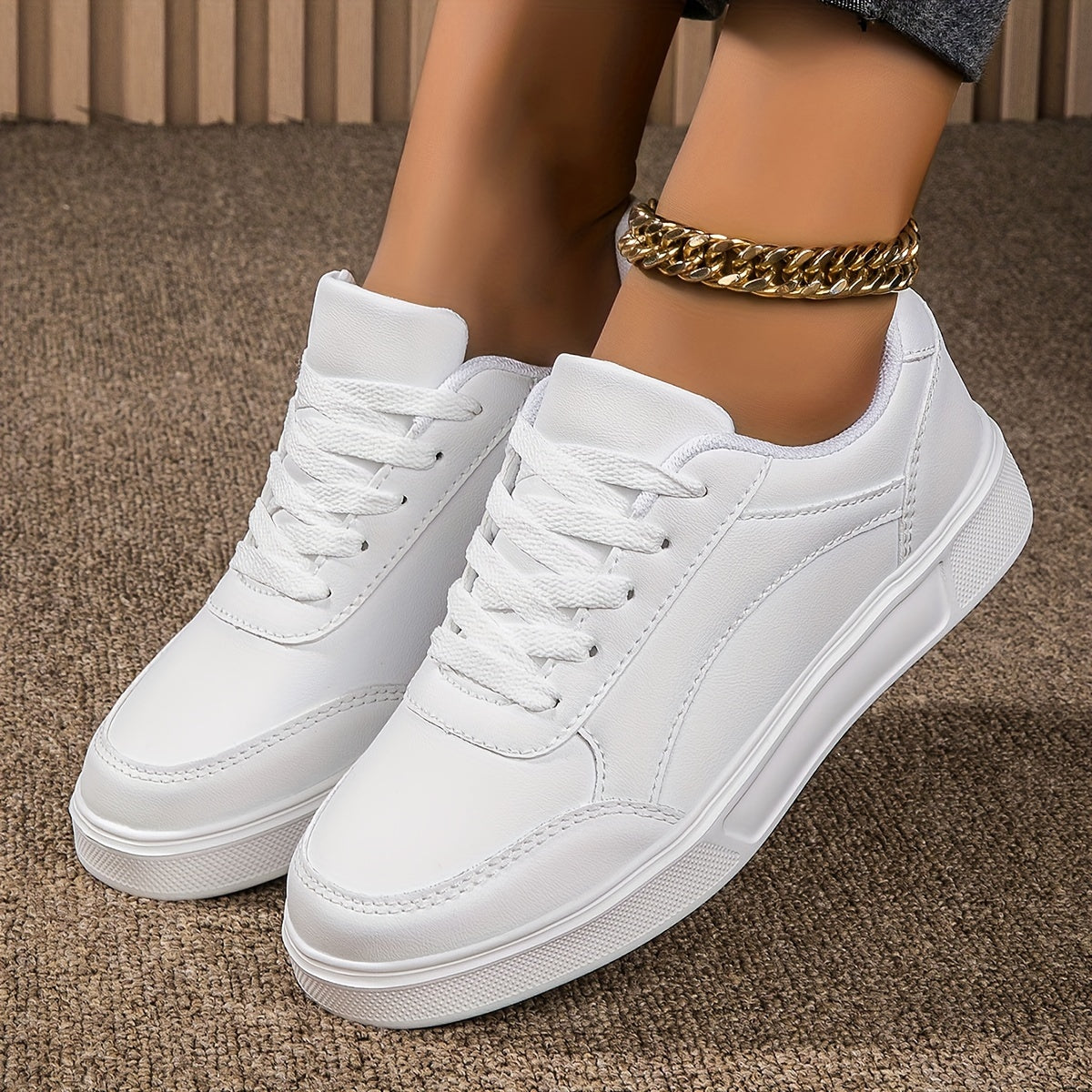 Women's classic white skate sneakers with durable build, casual lace-up low-top design, lightweight and comfortable non-slip EVA sole, easy to clean and versatile for walking or skating.