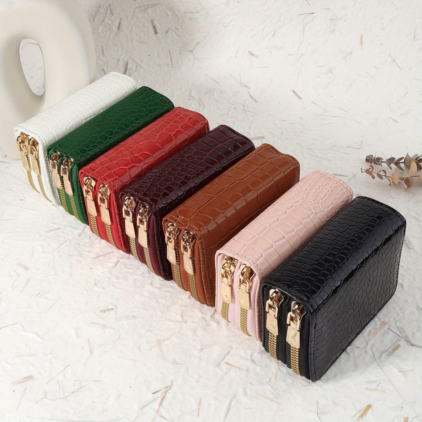 Women's crocodile pattern zipper wallet made of synthetic leather with double zipper, multi-card holder, available in green, white, pink, red, and black. Secure and stylish accessory.