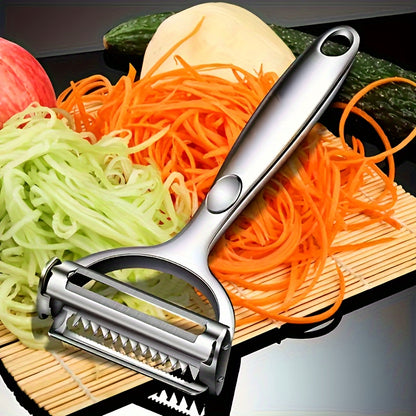 Durable stainless steel vegetable peeler with easy grip handle, ideal for home and restaurant use.