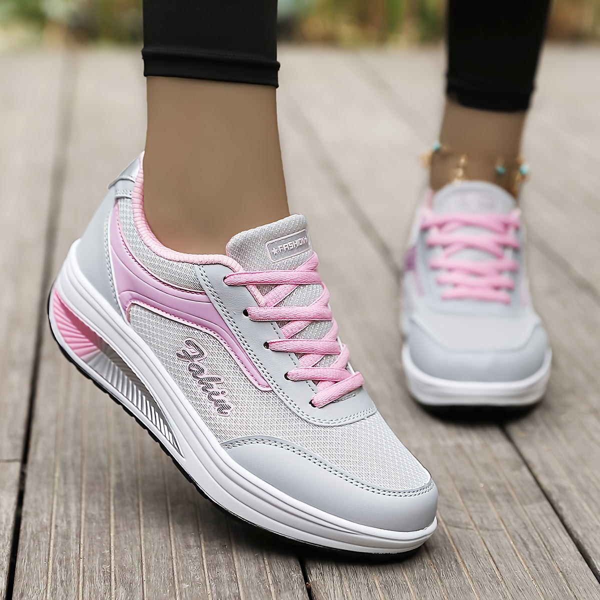 Women's platform sneakers with breathable mesh, lace-up design, and comfortable fit in plus size