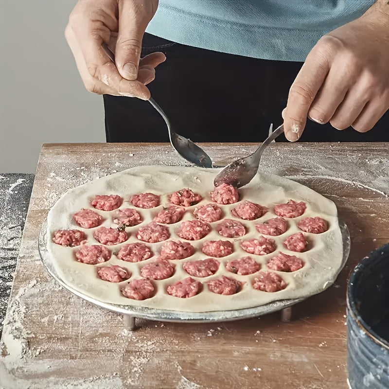 Convenient aluminum dumpling maker with 37 holes for making meat dumplings and other pastries at home. A must-have kitchen tool.