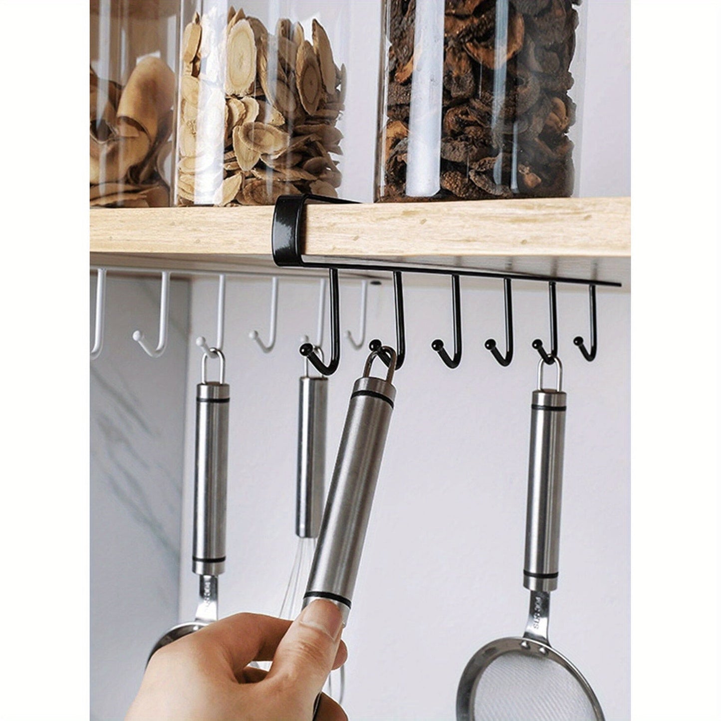 The Bluemeta Easy-Install 6-Hook Iron Storage Rack is a no-drill solution, ideal for organizing kitchen cabinets and utensils in a variety of vibrant colors.