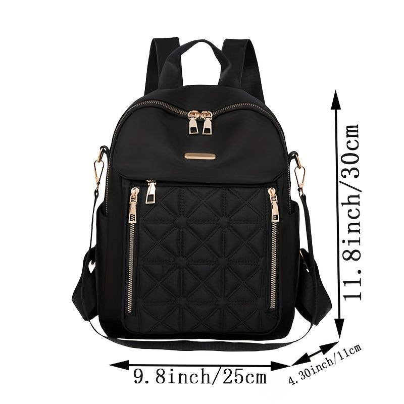 Stylish black nylon backpack for women with tassel detail, adjustable shoulder straps, multiple compartments for travel or daily use. Features durable zipper closure, quilted texture, and