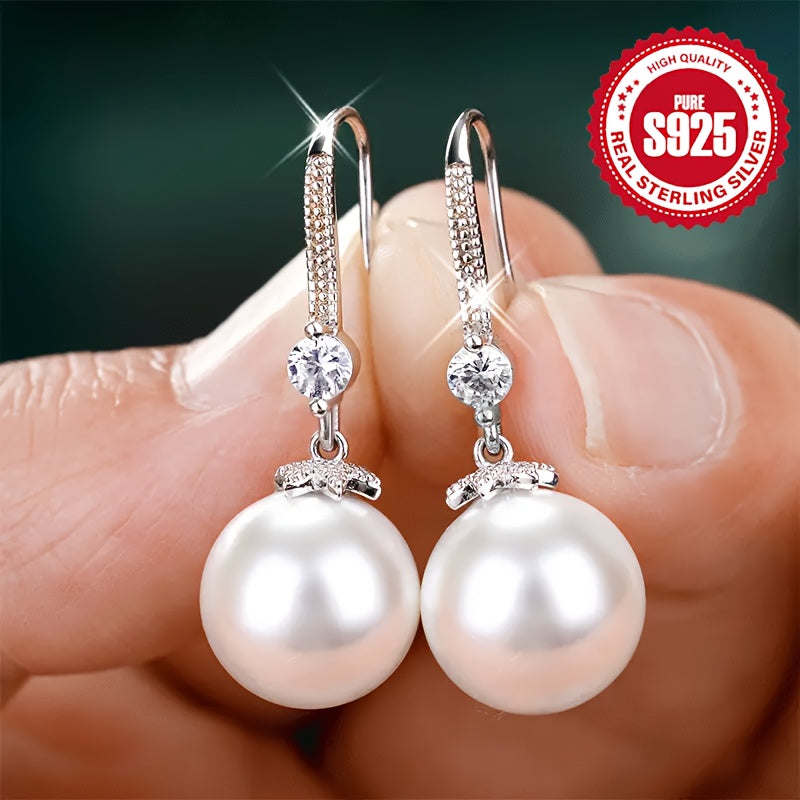 Stylish and hypoallergenic, these S925 sterling silver pearl earrings feature a minimalist design with a touch of sophistication, weighing 6.95g.