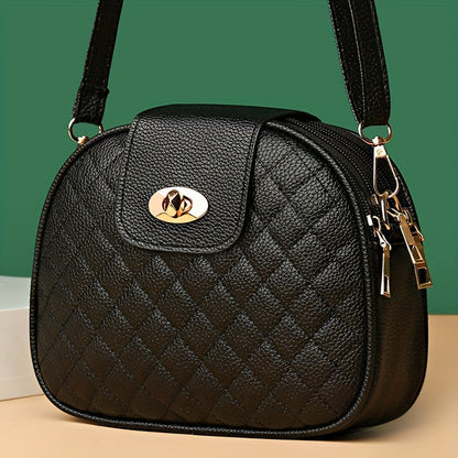 Women's black quilted crossbody bag with adjustable strap, zipper closure, tassel embellishment, and polyester lining.