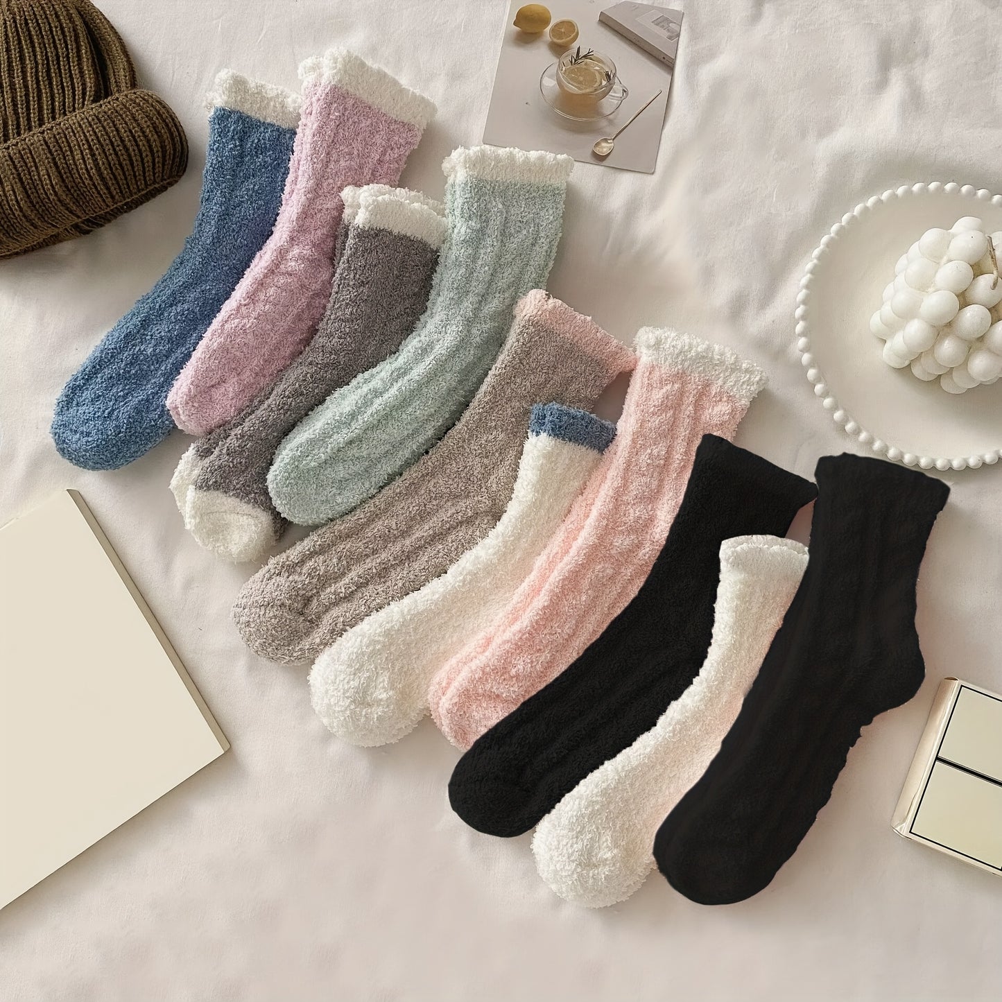 5 pairs of cozy, colorful mid-calf slipper socks for women in blue, green, pink, gray, and white.