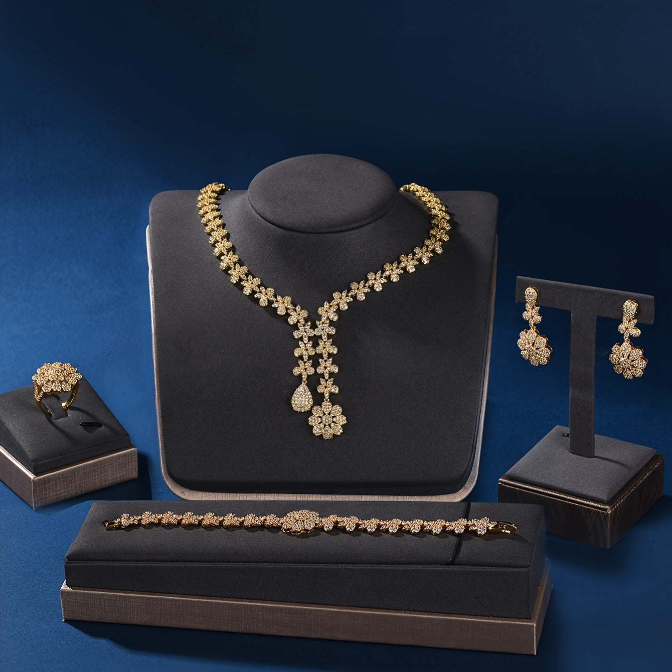 Luxurious 18K Gold Plated Copper Jewelry Set for Women featuring Synthetic Zirconia - Perfect for Parties and Holidays. This 5-Piece Set includes a Necklace, Bracelet, Earrings, and Ring, ideal for Weddings, Parties, and Thanksgiving celebrations.