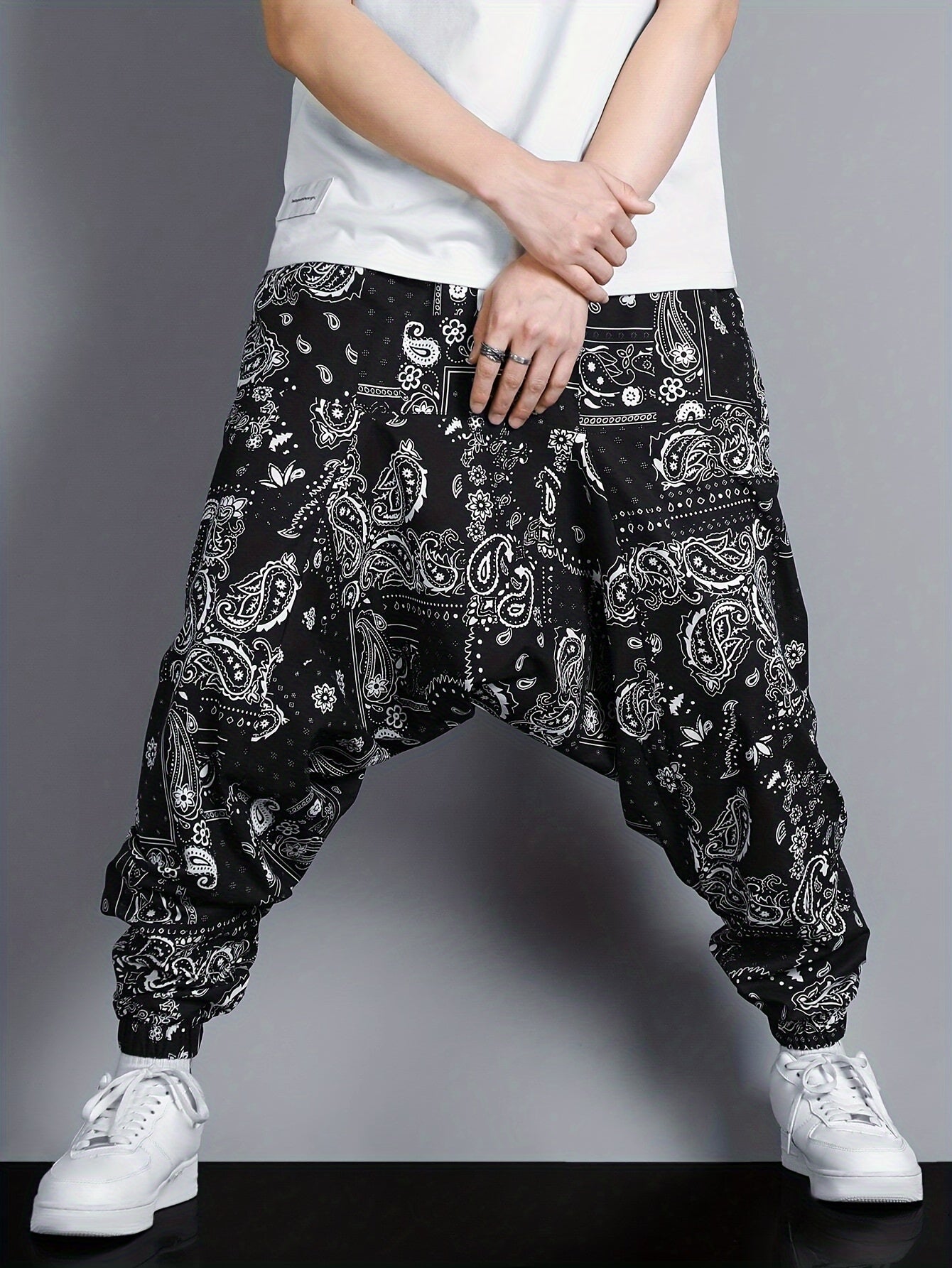 Men's oversized joggers featuring paisley pattern print.