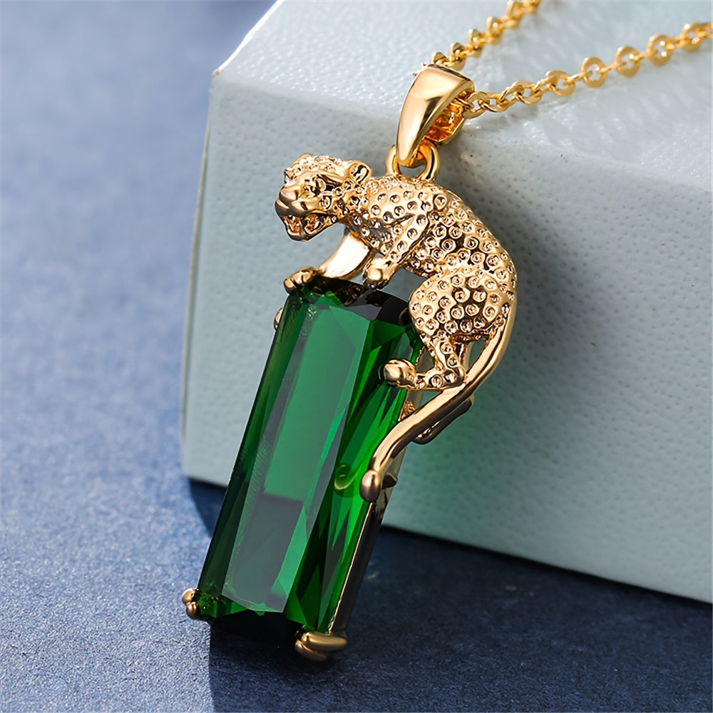 Golden plated green artificial crystal leopard pendant necklace, perfect for women who love hip hop punk style. This created emerald panther necklace makes a unique and stylish jewelry gift.