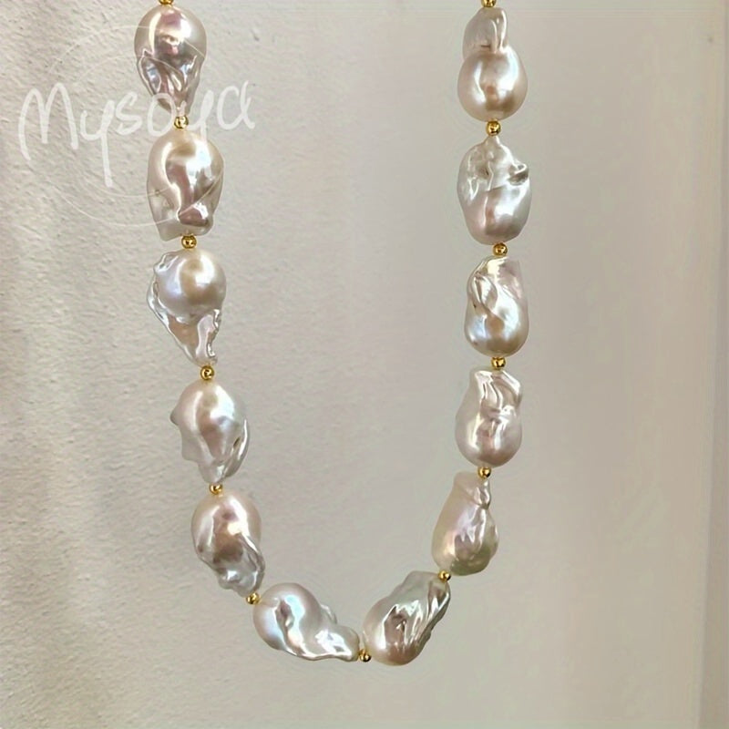 This elegant and unique baroque freshwater pearl necklace from MYSOYA Brand is the perfect accessory for any occasion. With pearls ranging from 14-23mm in size, this handmade boho necklace is a stunning choice for a party, wedding, anniversary, or as a