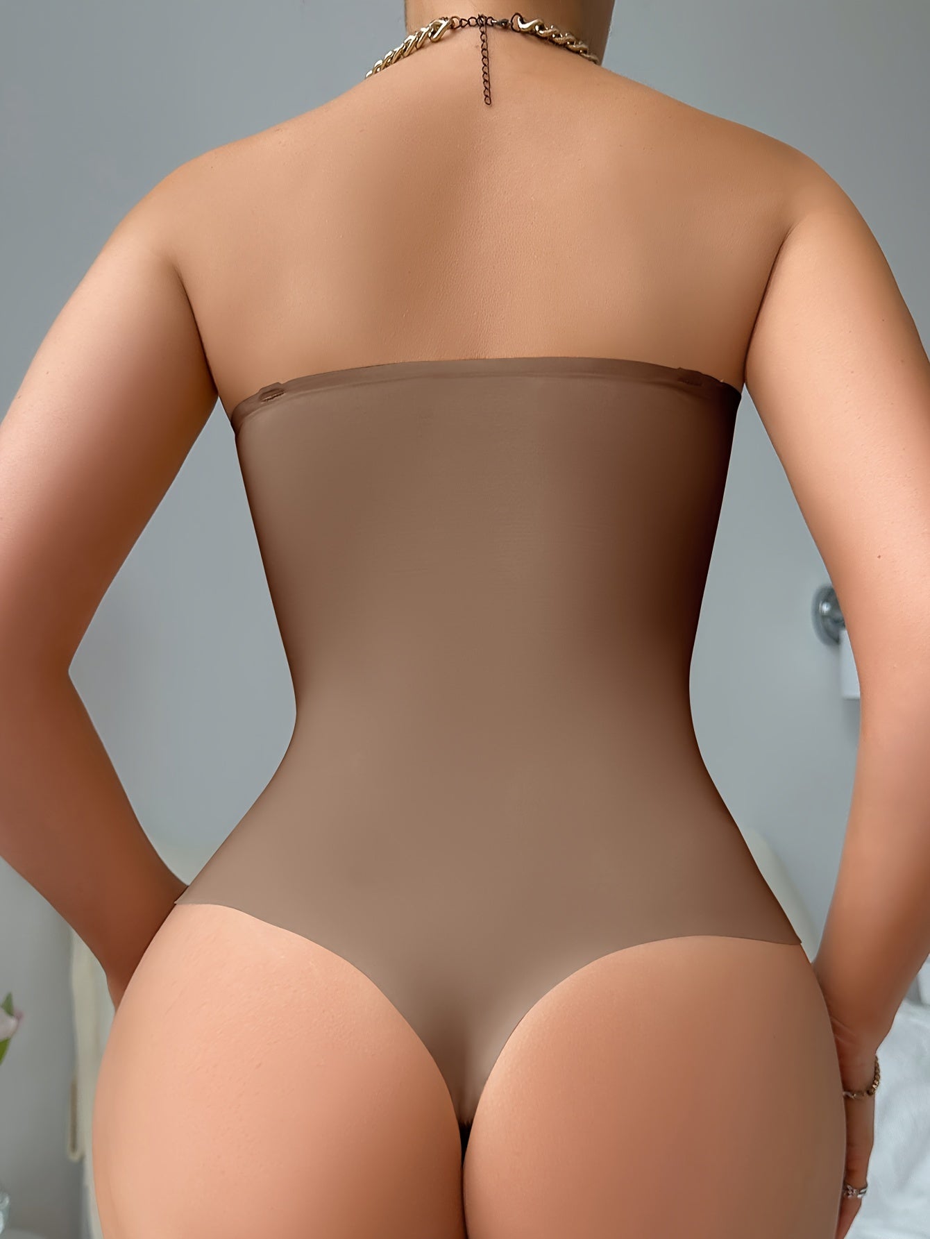 Shape your body with this braless shaping suit with hip liner