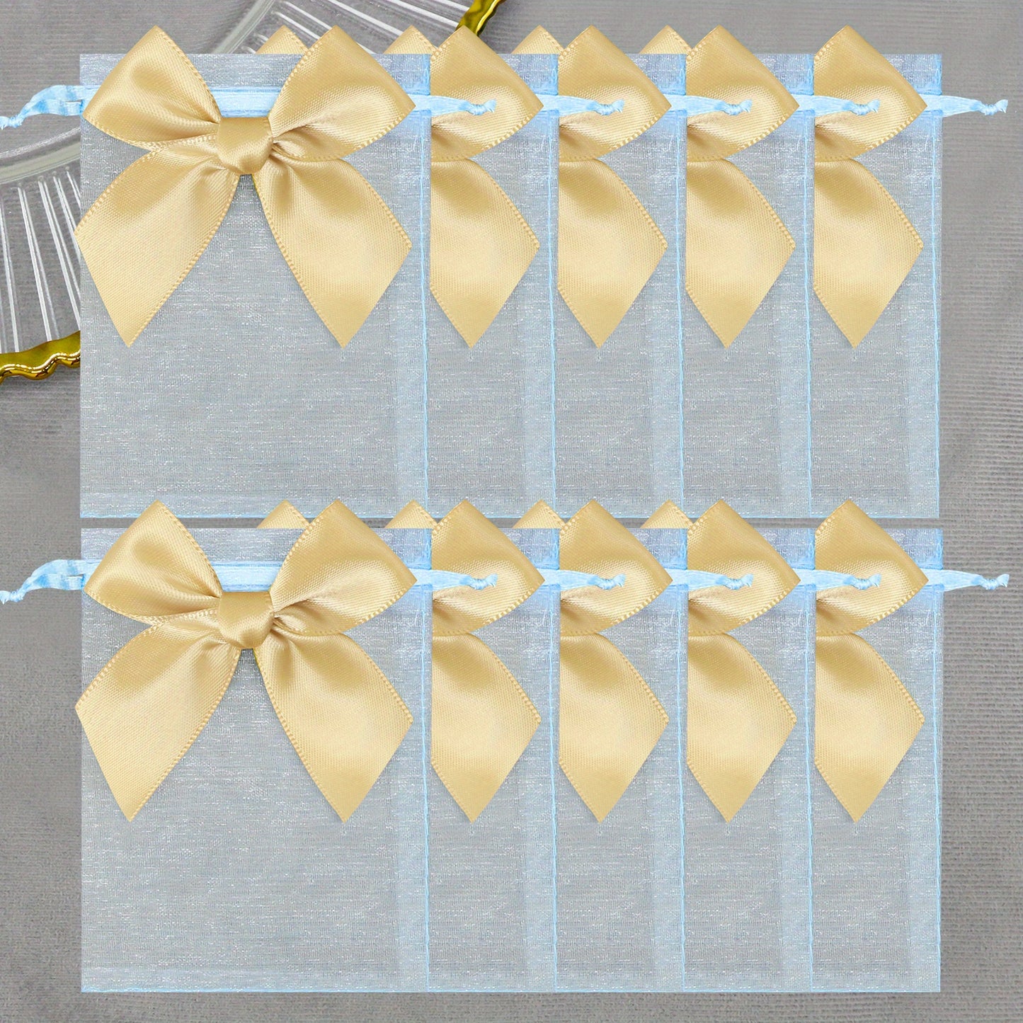 10 elegant organza bags with ribbon and bow, ideal for gift wrapping and party favors.