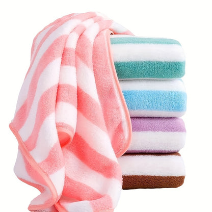 A modern, hard-wearing striped cotton towel perfect for gym, beach, travel or outdoor use, made of 100% cotton with quick-dry, ultra-soft and absorbent features. It is fade resistant and made of knit fabric, weighing 4gsm and in an oblong shape.