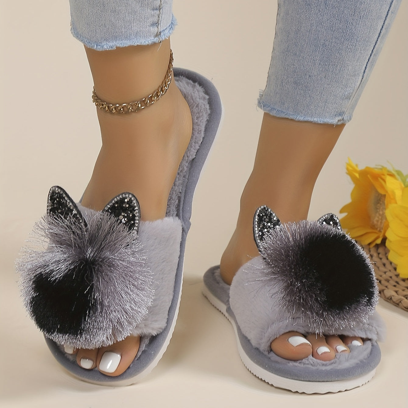 Adorable gray bow slippers with fluffy black accents, EVA sole, all-season comfort, and machine washable