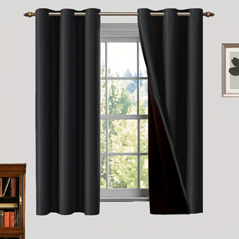 Two pieces of 100% blackout curtains made from polyester, coated and insulated with a grommet top design. Perfect for bedroom, living room, and home decor.