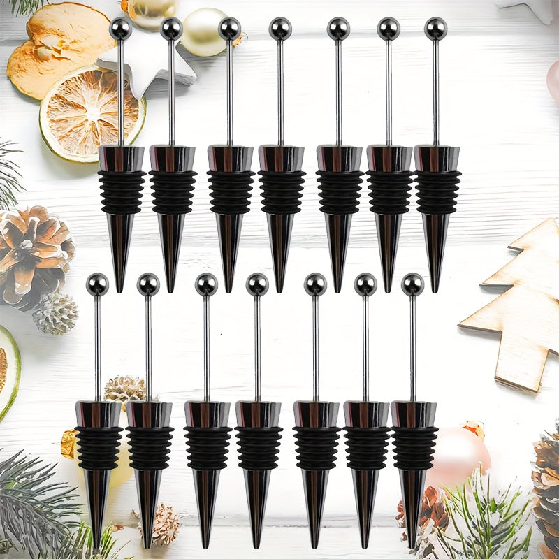 Set of 7/14/28 stainless steel wine stoppers for preserving red wine and champagne bottles. Essential bar accessories.