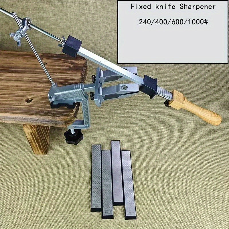 Manual kitchen sharpener with angle fixation, metal construction, uncharged, and emery grit whetstone set.