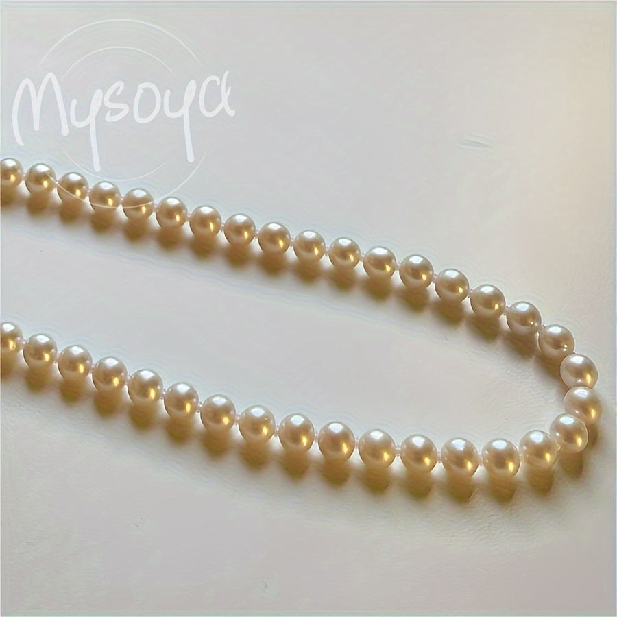 Enhance your look with the MYSOYA Elegant Handmade Freshwater Pearl Necklace. Featuring 5-6mm white pearls with a vintage OT clasp, this exquisite piece is perfect for weddings and daily wear. Presented in a chic gift box, it makes an ideal gift for